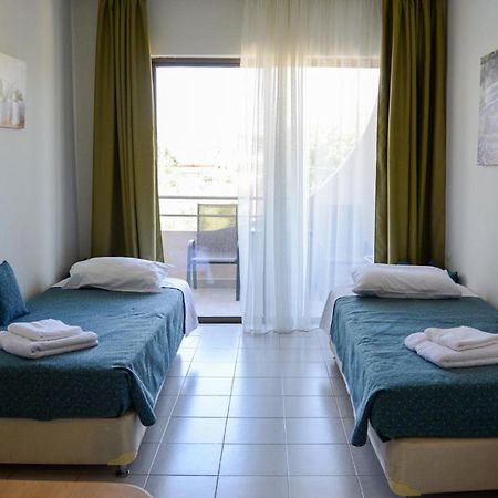 Ivory Hotel Theológos Eksteriør billede