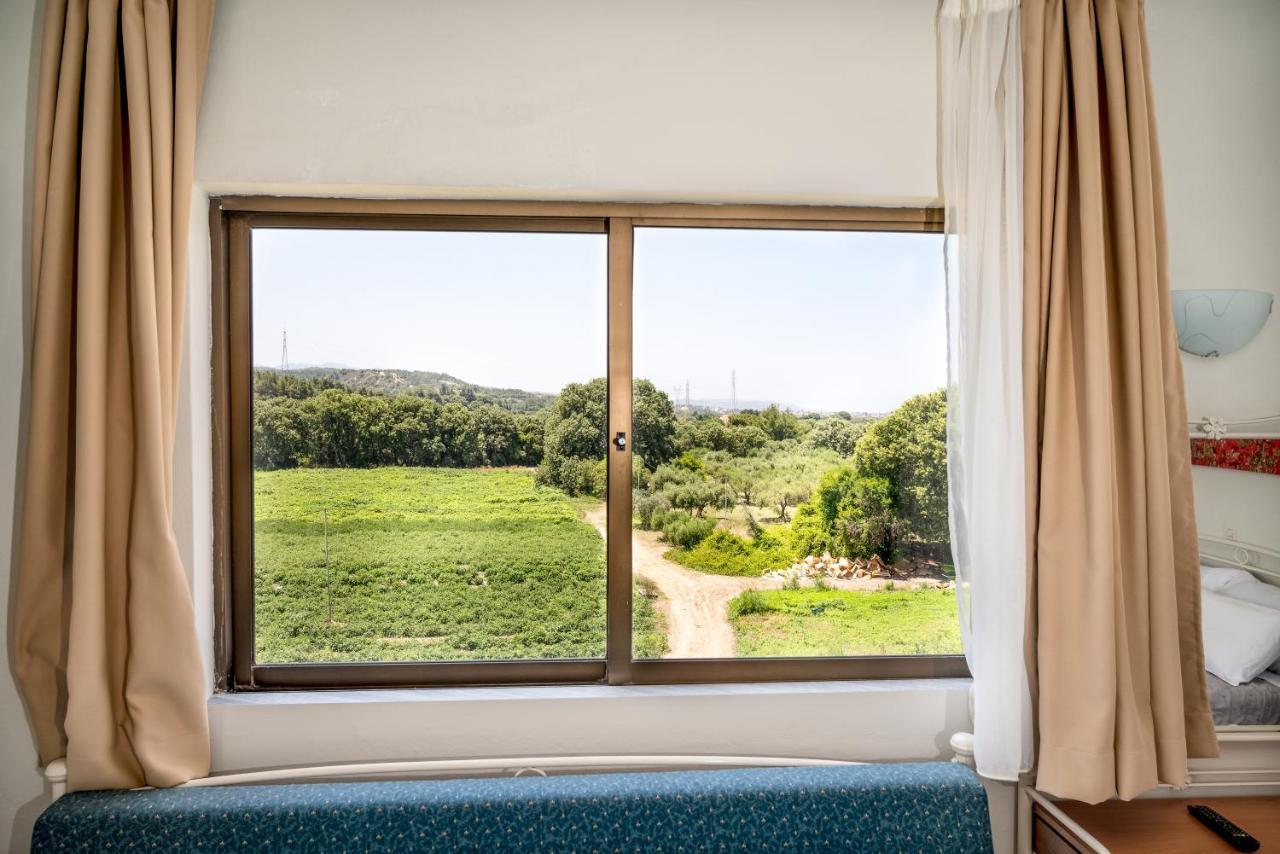 Ivory Hotel Theológos Eksteriør billede